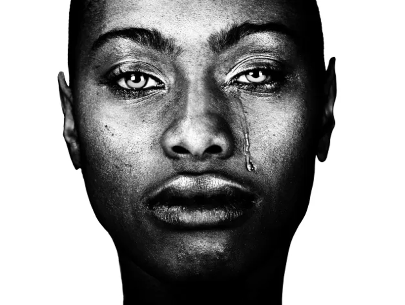 A man holding and reading the Holy Bible